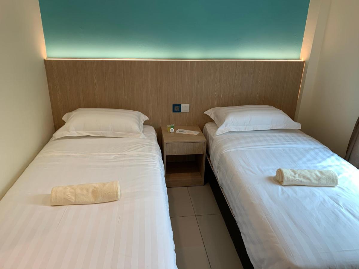 M Quality Hotel กัวมูสัง ภายนอก รูปภาพ